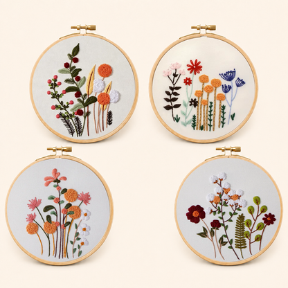 Four embroidery designs with fall wildflowers in hoops