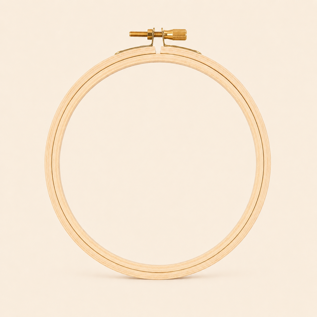 Plastic embroidery hoop on a beige background