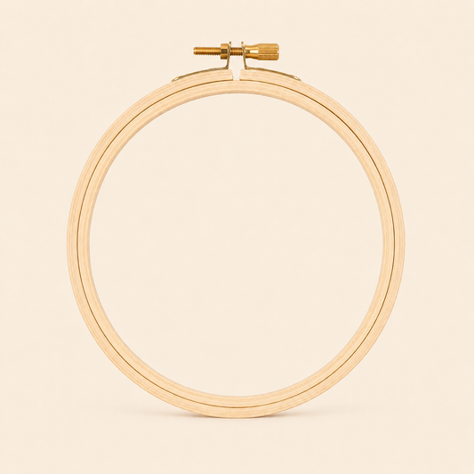 Plastic embroidery hoop on a beige background